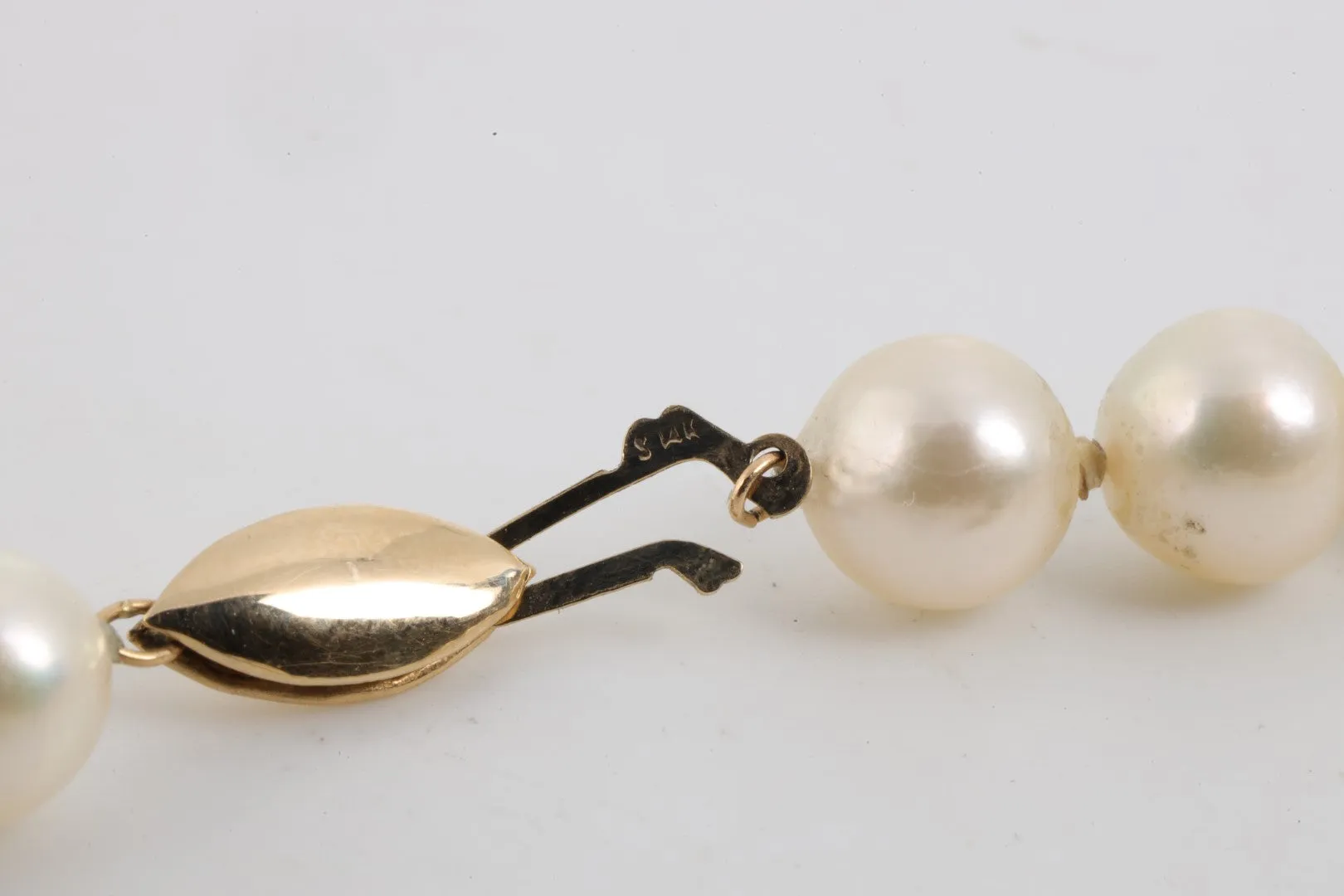 23.5" 14k Yellow Gold Pearl Necklace (51.23g.)