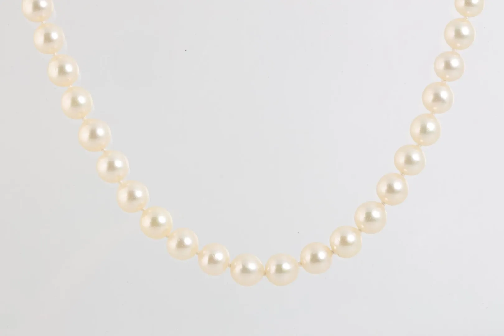 23.5" 14k Yellow Gold Pearl Necklace (51.23g.)