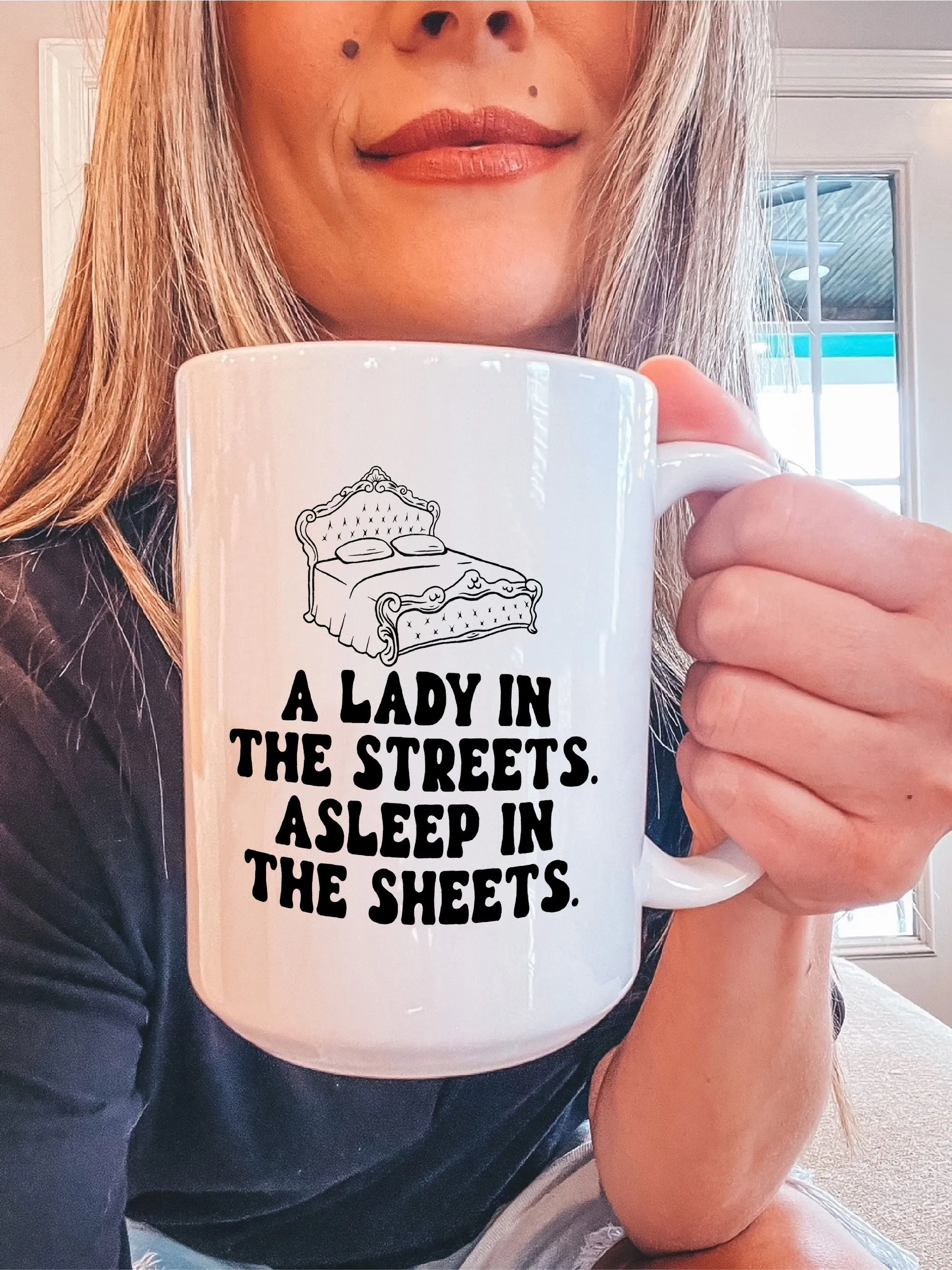 A Lady In The Streets. Asleep In The Sheets. Mug