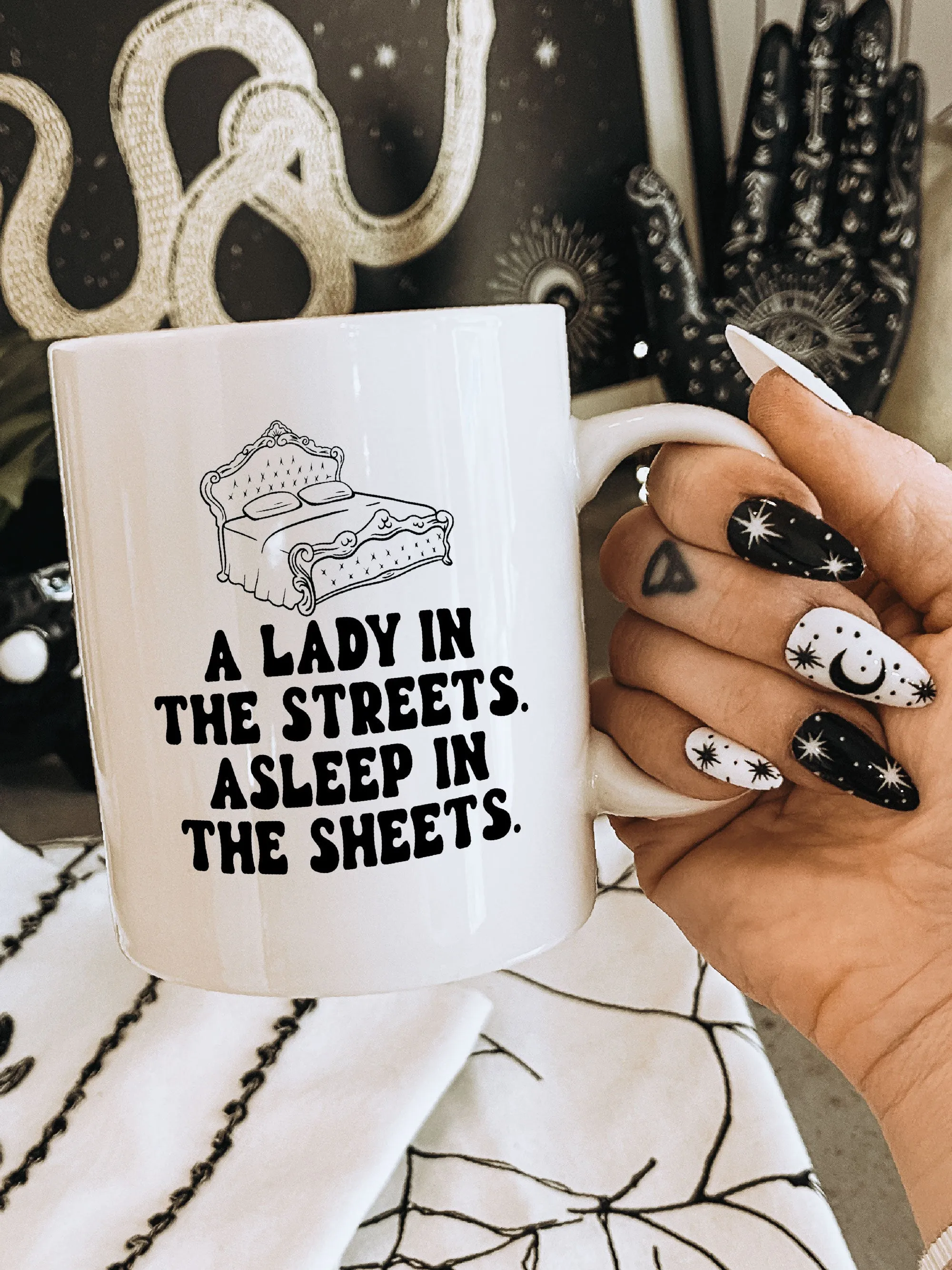 A Lady In The Streets. Asleep In The Sheets. Mug