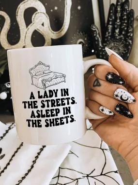 A Lady In The Streets. Asleep In The Sheets. Mug